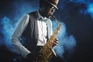 Portrait of a jazzman playing a saxophone