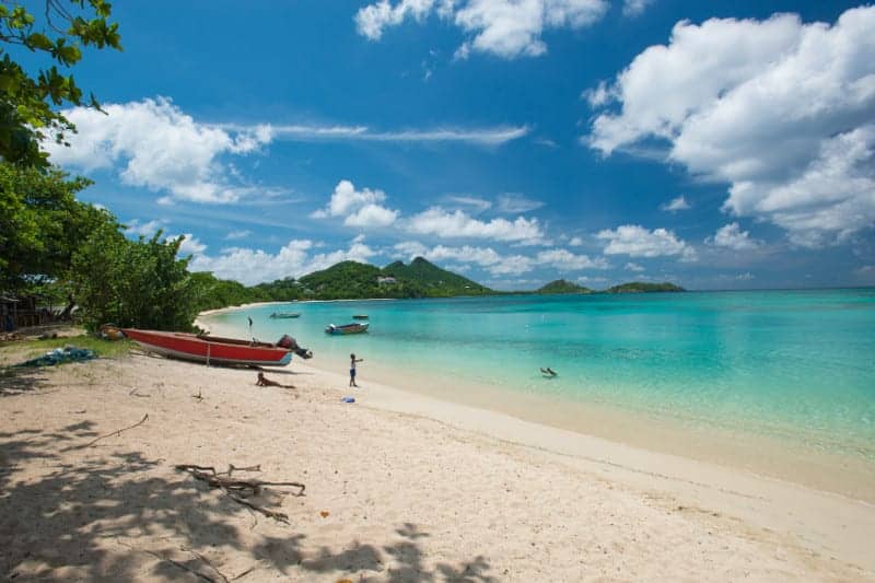 Fly to Grenada in teh Caribbean for gorgeous beaches like these on Carriacou Island