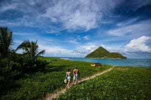 Couple walking Levera Beach - Grenada